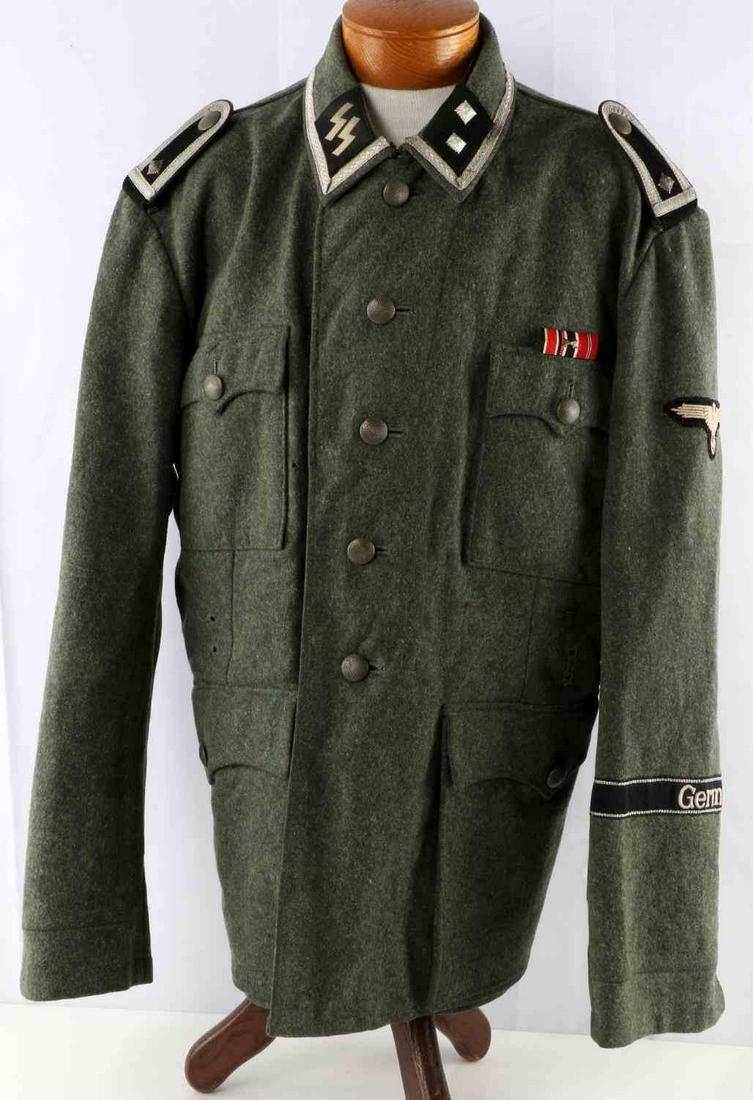 WWII GERMAN WAFFEN SS SENIOR SQUAD LEADER TUNIC: WWII German Waffen SS Tunic. Wool construction with gray interior. Silver piping around the collar. SS collar tabs with Senior Squad Leader rank pips and shoulder boards. Greened buttons with matching