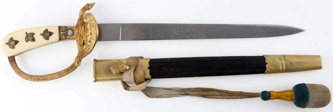 WWII GERMAN THIRD REICH HUNTSMAN DAGGER BY HOLLER: Steel blade engraved with hunting scenery with Bakelite grip, brass gilt clamshell and D guard. Grip embellished with acorns and oak leaves. F.W. Holler marked on reverse of blade. Scabbard with leath