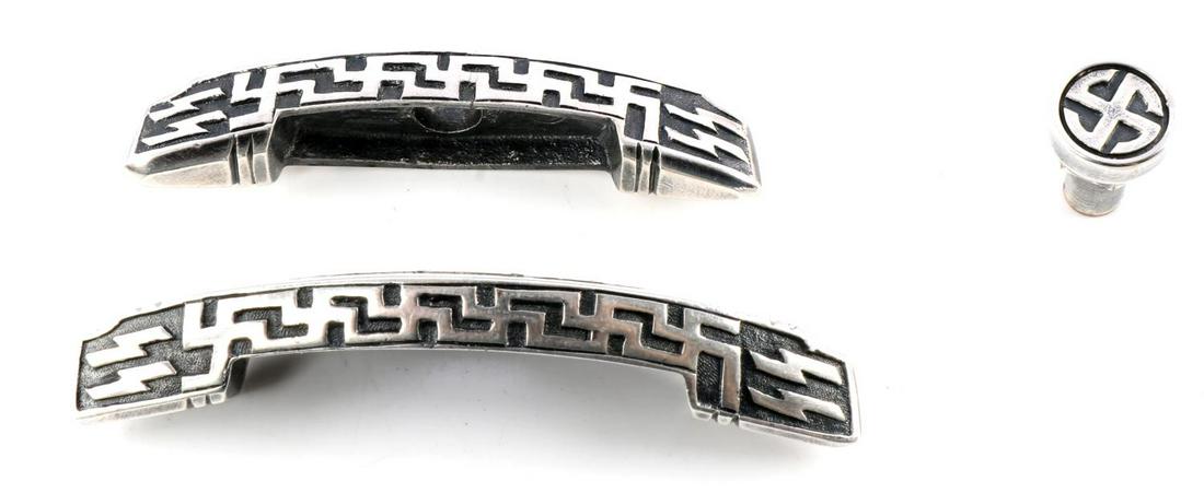 WWII GERMAN THIRD REICH SILVER SS DAGGER GUARDS: SS Honor dagger crossguards. Features swastikas and SS runes with H marked inside. Acid tests for silver. Very good condition.