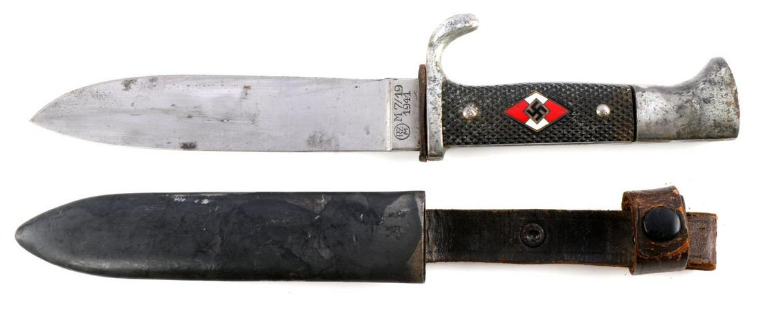 WWII GERMAN THIRD REICH HITLERJUGEND KNIFE: Steel blade with nickel finger guard and pommel. Diamond pattern Bakelite grips with inlaid HJ insignia. Painted magnetic scabbard. Blade missing motto. Marked RZM M7/19 1941 on obverse. Reverse marke
