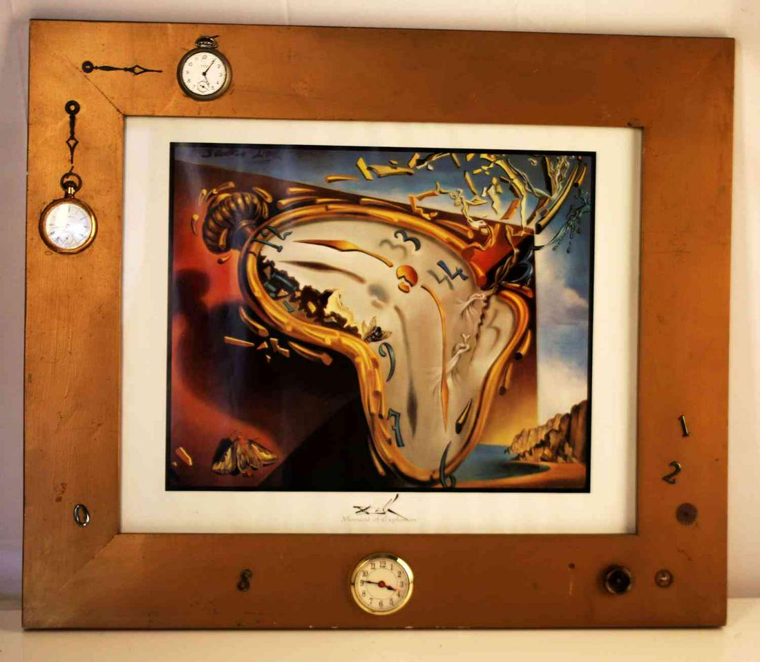 FRAMED SALVADOR DALI PRINT MOMENT OF EXPLOSION: Salvador Dali, Moment of Explosion Print, Framed. Frame measures 22X26 inches. Picture measures 15x19 inches. Frame is embellished with pocket watches and watch mechanisms. Includes wire for hanging. 