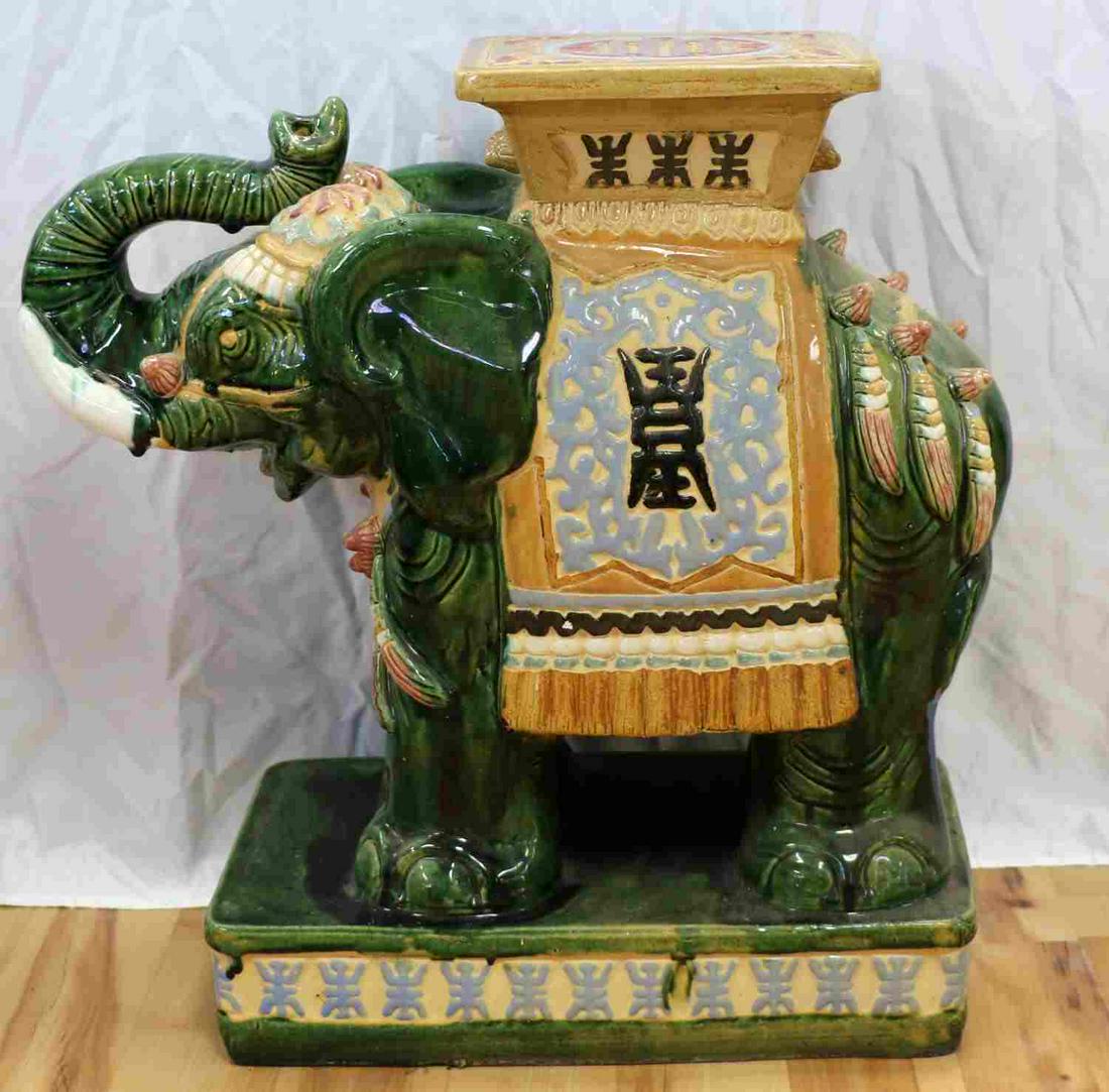 MID CENTURY VIETNAMESE ELEPHANT GARDEN SEAT: Vintage 1950-1960's Vietnamese glazed ceramic Elephant stool, plant stand or garden seat. In good condition measuring 22x22x10 inches.