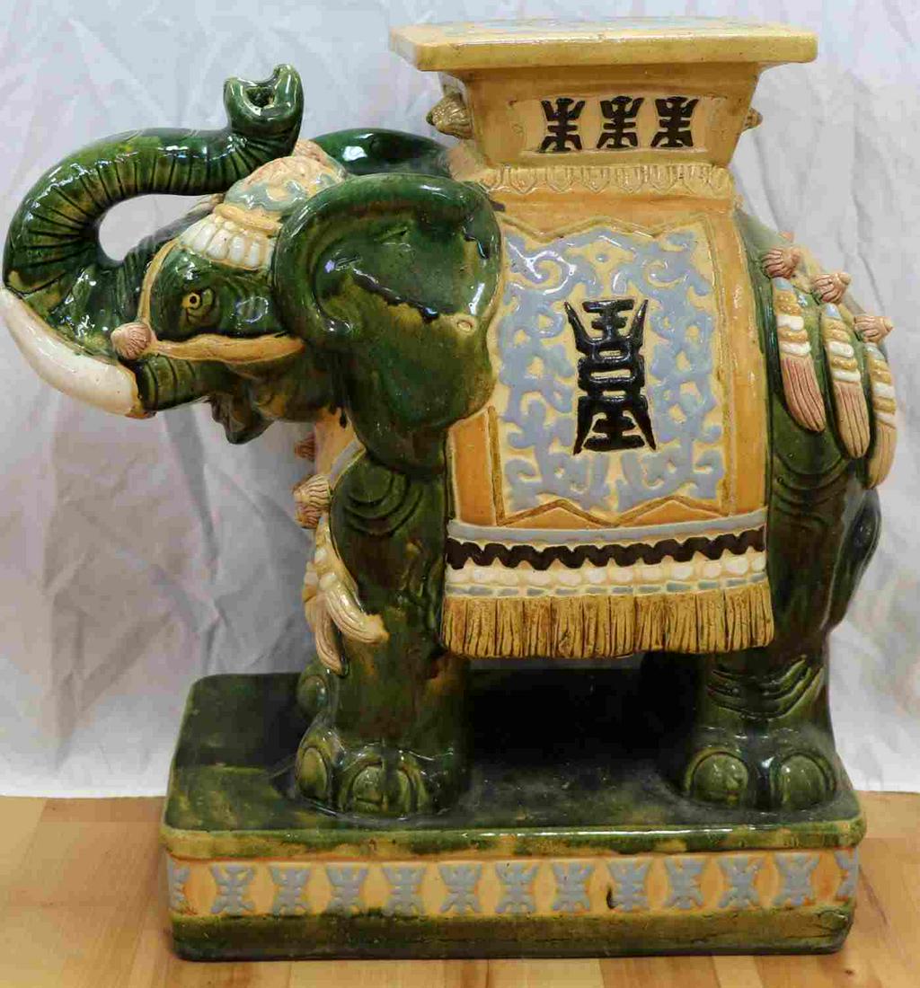 MID CENTURY VIETNAMESE ELEPHANT GARDEN SEAT: Vintage 1950-1960's Vietnamese glazed ceramic Elephant stool, plant stand or garden seat. In good condition measuring 22x22x10 inches.