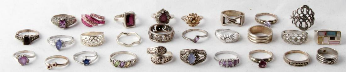 STERLING SILVER RING DEALER LOT OF 28: Dealers lot of 28 Sterling silver rings. Total weight 102 grams. all in good wear or resale condition. This lot has a reserve.