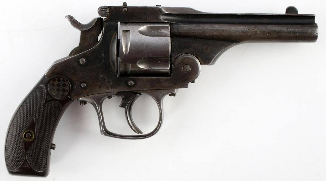 BELGIAN .32 S&W TOP BREAK 5 SHOT REVOLVER: Blued steel 3.5 inch barrel with good clear bore, ELG mark to rear face of cylinder, .32 S&W cartg marked to top, bakelite grips, double action works, however play in cylinder. Screws on underside are