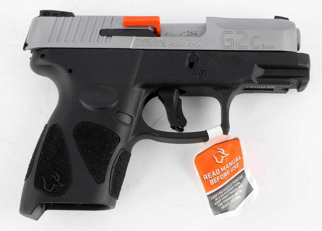 TAURUS G2C SEMI AUTO PISTOL 9 MM NEW IN BOX: Two-tone steel and polymer construction, clear markings with serial number marked twice to right side and underneath, 3.25 inch barrel with mint bore, comes in box with two 12-rd magazines, lock and k