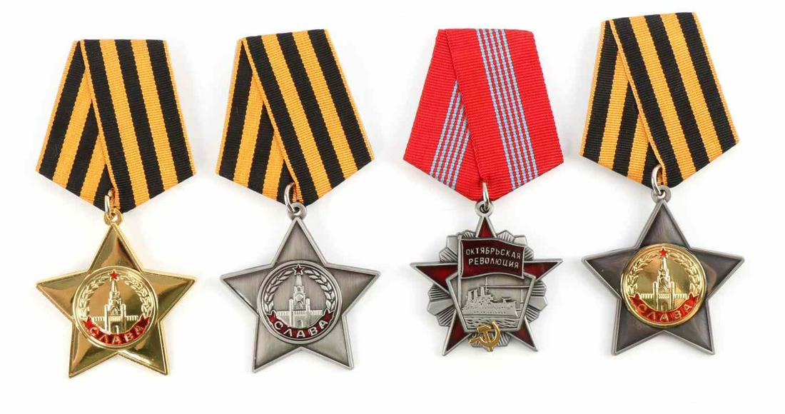 4 USSR SOVIET RUSSIAN MILITARY CLASS AWARD BADGES: Lot of 4 USSR Soviet Russian Military Class Award Badges. Full set of 3 classes of "Military Glory" and the "October Revolution." Marked "CCCP" and "3669." Described as museum copies. Very good condit