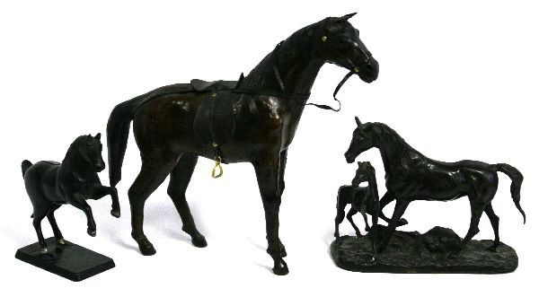 ANTIQUE BRONZE HORSE & CAST IRON BANK FIGURINE LOT: 3 horses to include a bronze Mare and Foal 9x7 inches, a original cast iron horse bank no maker mark 4.5x7.5 inches, and a leather horse standing 13 inches.