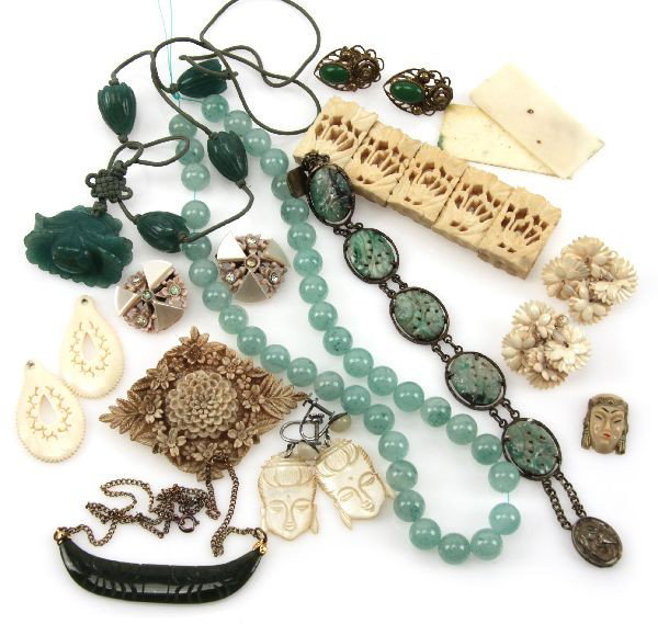 VINTAGE ASIAN JADE BONE MOTHER OF PERAL JEWELRY: A collection of Asian themed jewelry, including: a Chinese silver and carved jade bracelet, (3) carved jade necklaces, a pair of Czechoslovakian jade earrings, and a grouping of bone, mother of pearl,