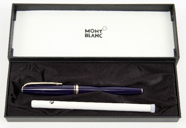 MONTBLANC 14K GOLD BLUE GENERATION ROLLERBALL PEN: German made Montblanc rollerball # 13301 Generation pen in navy blue with 14K gold trim. Includes box, service guide, and rollerball refill. Very good condition.
