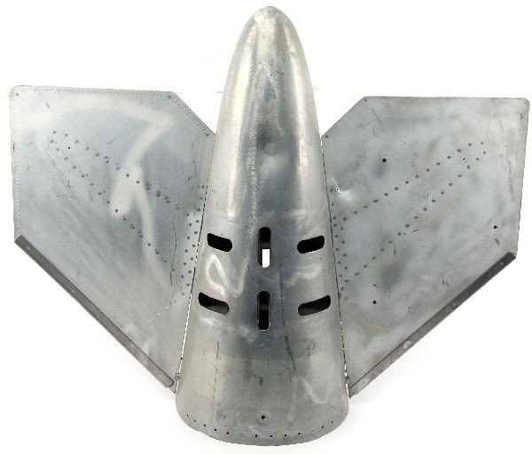 TAIL SECTION FROM NAVAL PRACTICE TOW TORPEDO: Fins and tail appearing to be from a Navy practice tow torpedo. Aluminum construction. Measures 29.5 inches long, 35.5 wide including fins, and 12 inches in diameter at widest point.