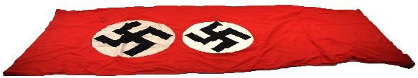 RARE GERMAN WWII BANNER WITH 3 SEWN INSIGNIAS: 6 feet by 28 inches. Red cotton with sewn on white fields. hand applied swastikas to double sided pair. Third applied field has printed swastika. Overall condition is very good with only minor foxing 