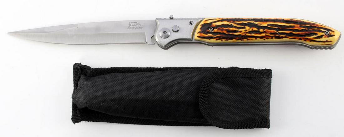 STAINLESS 12 INCH SWITCHBLADE AUTO FOLD KNIFE: Automatic folding action switchblade knife, length 12 inches, stainless steel blade with Faux jigged bone handle.