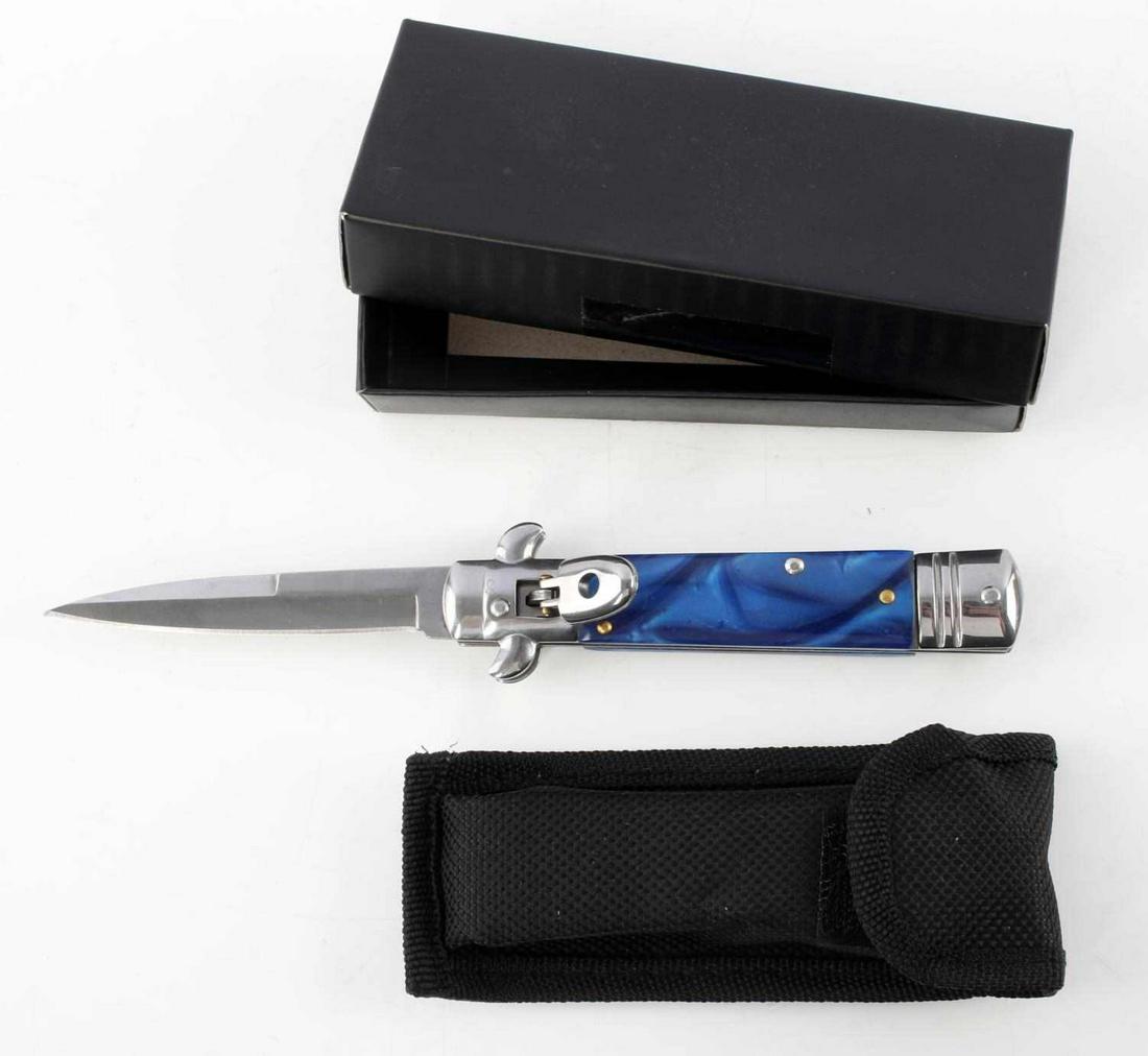SWITCH BLADE KNIFE PUSH BUTTON W STAG GRIP: Steel blade with stag grip. Push button. Measures 12 1/2 inches overall. No maker's mark.