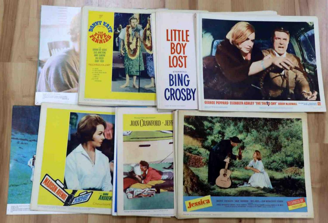70 ASSORTED VINTAGE THEATRICAL PROMO LOBBY CARDS: Approximately 70 original vintage, full-color theatrical lobby cards from the 1950s-80s. Cards measure 14 x 11 inches. Featuring "Sharky's Machine" with Burt Reynolds, "Romancing the Stone" with Micha