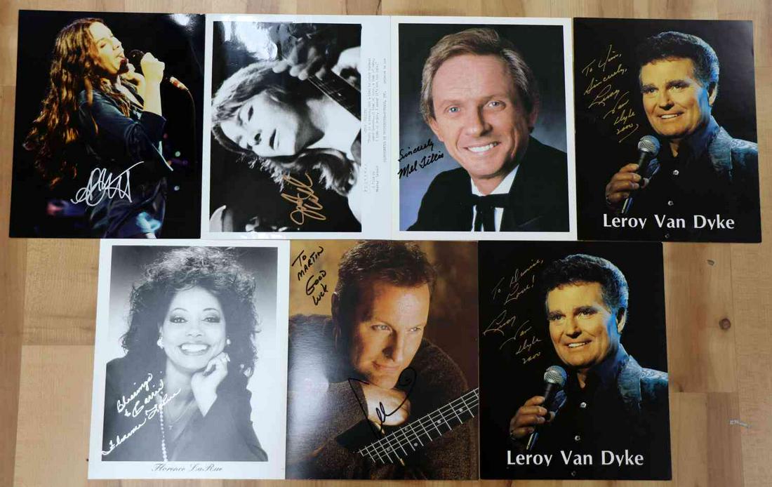 LOT OF 7 FAMOUS MUSICAL ARTIST AUTOGRAPHED PHOTOS: Lot of SEVEN (7) black & white and color photos/headshots of famous musical recording artists. Includes Alanis Morissette, Judy Collins, Mel Tillis, Florence LaRue ("The 5th Dimension"), and more. A f