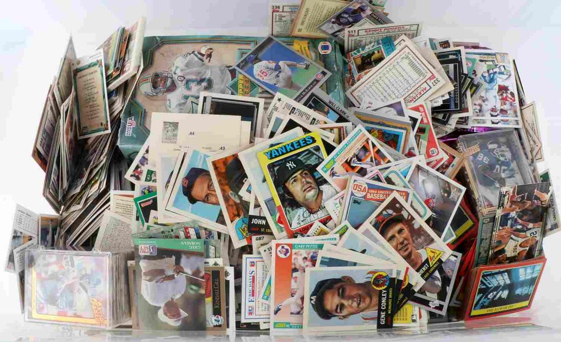 UNSEARCHED 400+ BASEBALL FOOTBALL CARD LOT: 400+ unsearched 1990's baseball, basketball, and football card lot. Cards include Barry Bonds, Magic Johnson, John Elway, Dave Justice and more. All in good condition.