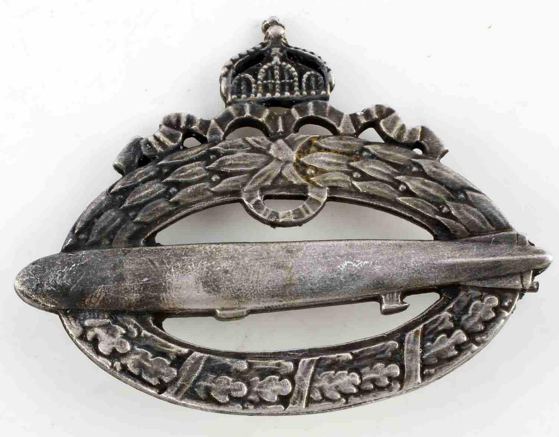 WWI IMPERIAL GERMAN ZEPPELIN PILOT BADGE SILVER: Nickel construction with thin horizontal pin back with C-hook closure, unknown maker. Very good condition.
