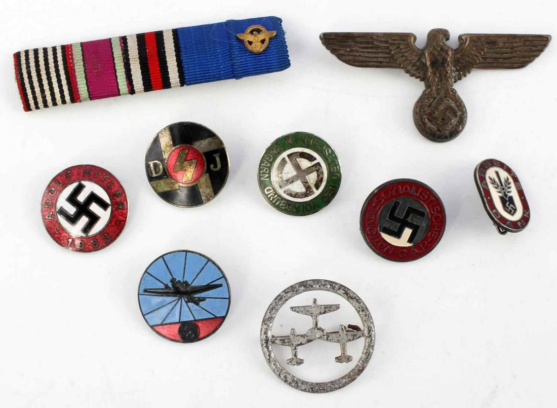 WWII GERMAN REICH LOT OF PINS NSDAP RAD LUFTWAFFE: WWII German Reich lot of pins to include two NSDAP pins, one which reads "Adolf Hitler 1933", the other reads "National Sozialistische DAP". A Luftwaffe enamel bomber pin. A German Hungarian Volksbund
