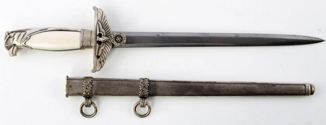 WWII GERMAN THIRD REICH DIPLOMAT DAGGER NSDAP: WWII German Third Reich Diplomat Dagger & Scabbard, measures approx. 14.5 inches in total length with a 10 inch blade. Reverse of blade is marked "F.W. Holler Berlin" near ricasso. Crossguard displays