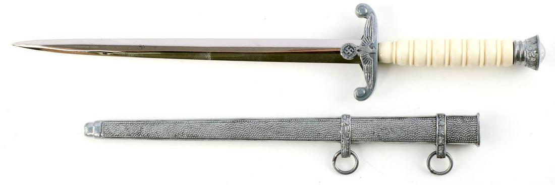 WWII GERMAN MINIATURE HEER DAGGER W SCABBARD: Steel blade with white plastic grip. Measures 7 3/4 inches. Modern production.