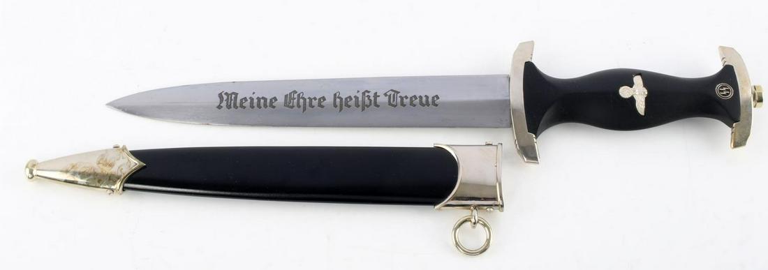 WWII GERMAN THIRD REICH SS DAGGER W SCABBARD NSDAP: WWII German Third Reich SS Dagger with Scabbard, measures approx. 13.75 inches in total length with a 8.5 inch blade. Blade is marked "Meine Ehre Heist Treue" on obverse and is marked "Boker Solingen"