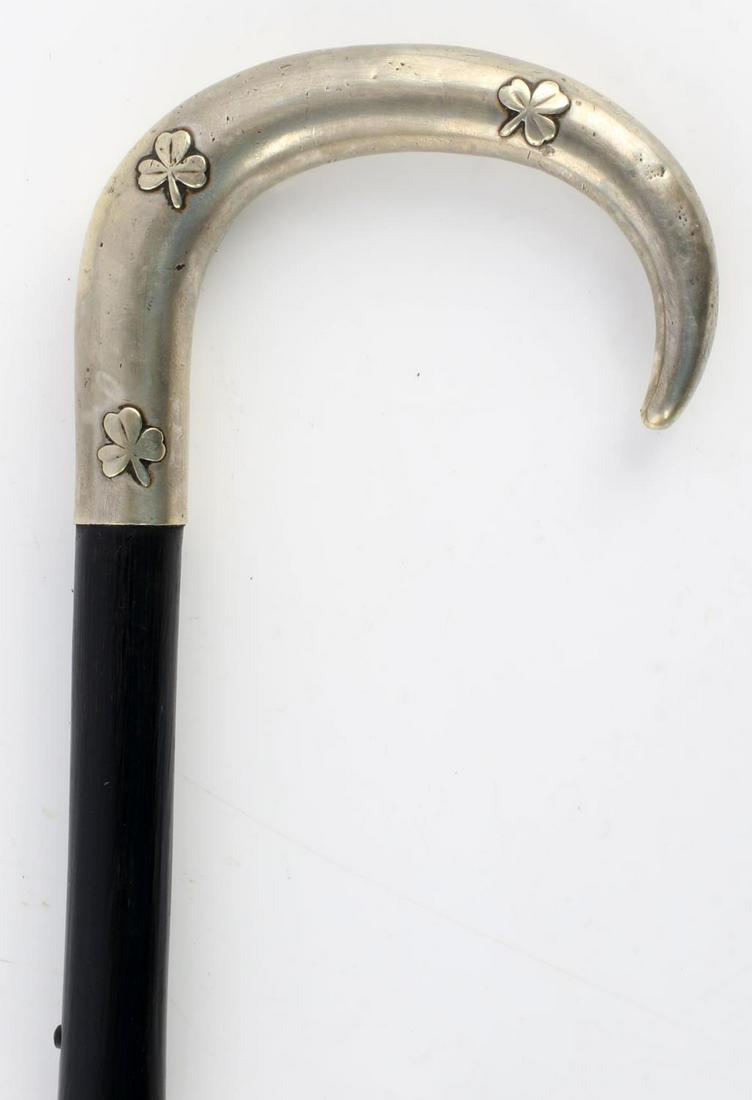 ANTIQUE SWORD CANE SOUZY PARIS BLADE SHAMROCK GRIP: What a nice example, French silver 85% hallmark, shamrock grip, button release to blade at 6 inches, Souzy Paris Forge and Fencing supply stamped, very good original blade, ebonized wood with original