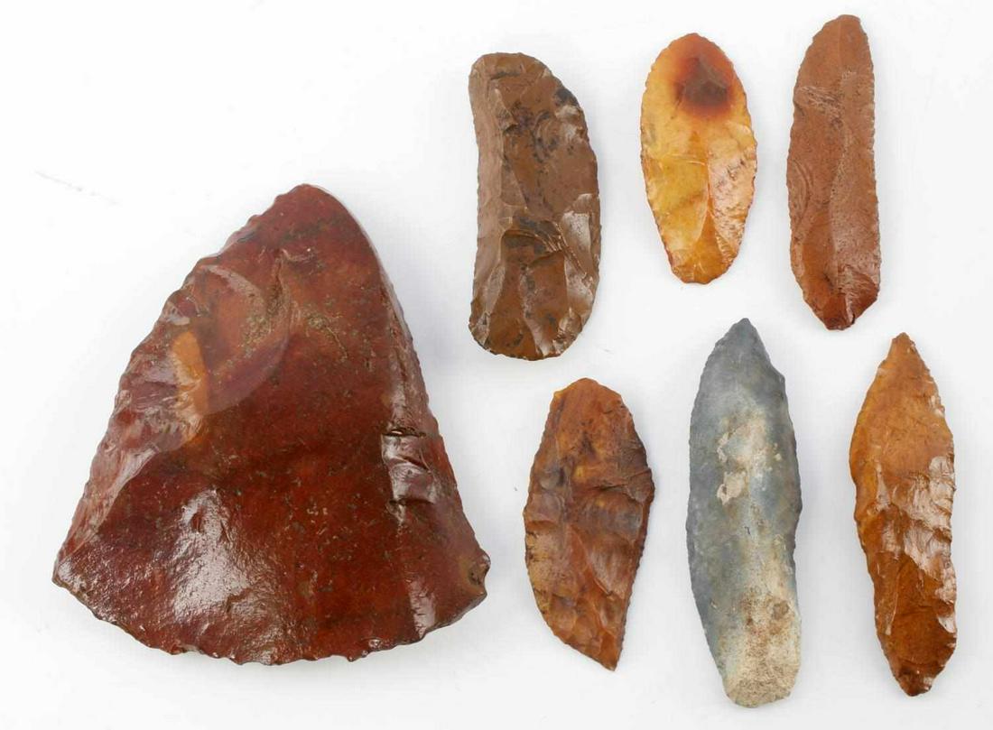 NATIVE AMERICAN PRE COLUMBIAN TOOL LOT OF 7: Lot features 6 spalls and a large axe form scraper. 5 of the spalls including the scraper feature Chipola river patination. Spalls measure 3 1/4 inches. Axe form measures 5 3/4 inches. Very good condi