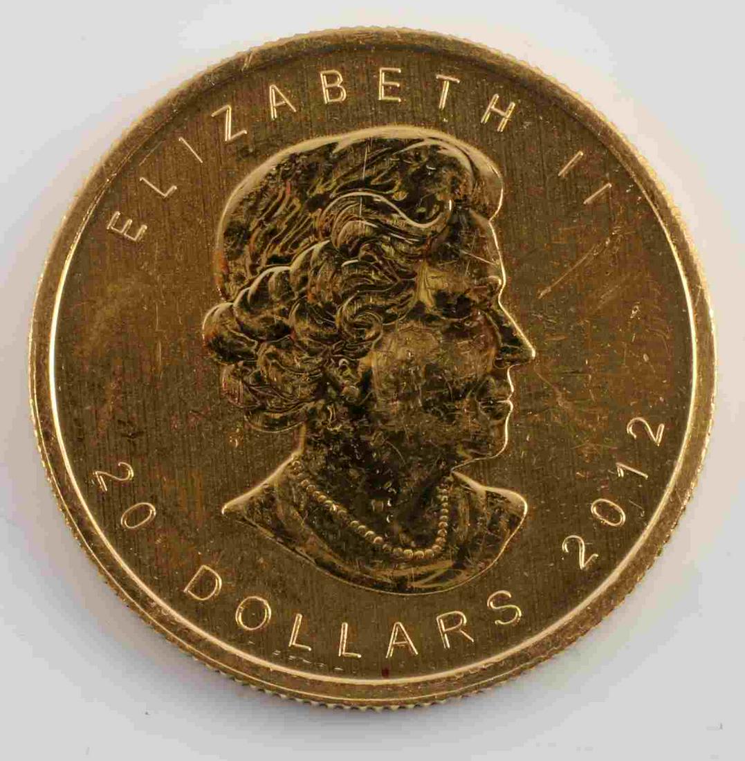 1/2 OZ GOLD 2012 CANADIAN MAPLE LEAF COIN: Brilliant uncirculated 1/2 troy ounce .999 fine gold Canadian Maple Leaf coin