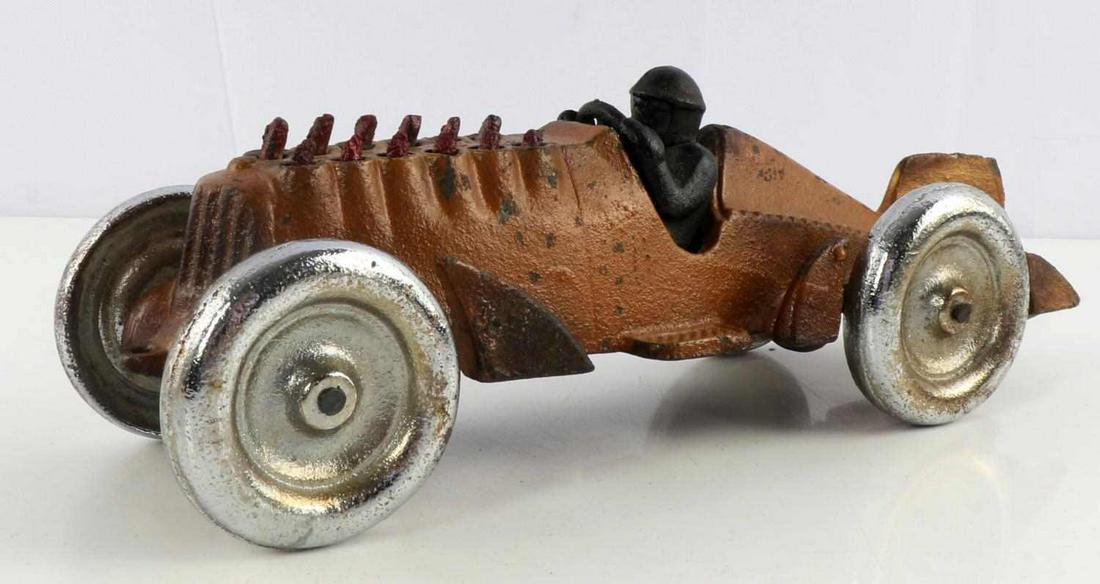 ANTIQUE HUBLEY 12 CYLINDER PULL CAR FIRING PISTONS: Wheels may have been repainted otherwise appears original, pull hole at front , 10 1/2 inches.
