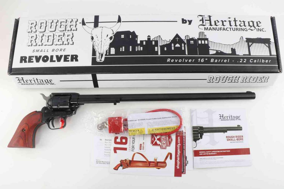 NEW IN BOX HERITAGE 16 INCH BARREL 22LR REVOLVER: New in box Heritage Rough Rider Small Bore Revolver, measures approx. 22 X 1.5 X 5 inches. Has a 16 inch barrel, 22LR caliber, front and rear sights, dark wood styled Zamak 5 grip. Comes new in box wi