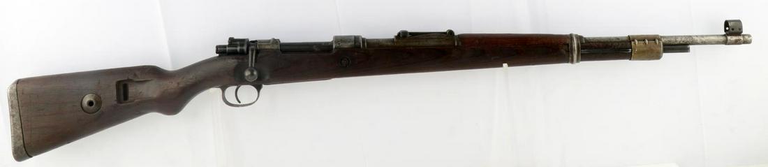 LATE WAR KRIEGSMODEL K98 STEYR DAIMLER SS RIFLE: Late War Kriegsmodel K98 SS rifle in 8MM Mauser from Steyr Daimler-Puch. Carbine is made from a myriad of different K98s. Receiver is marked "bnz. 42", "mod. 98", with the serial number "6610"; a nitr