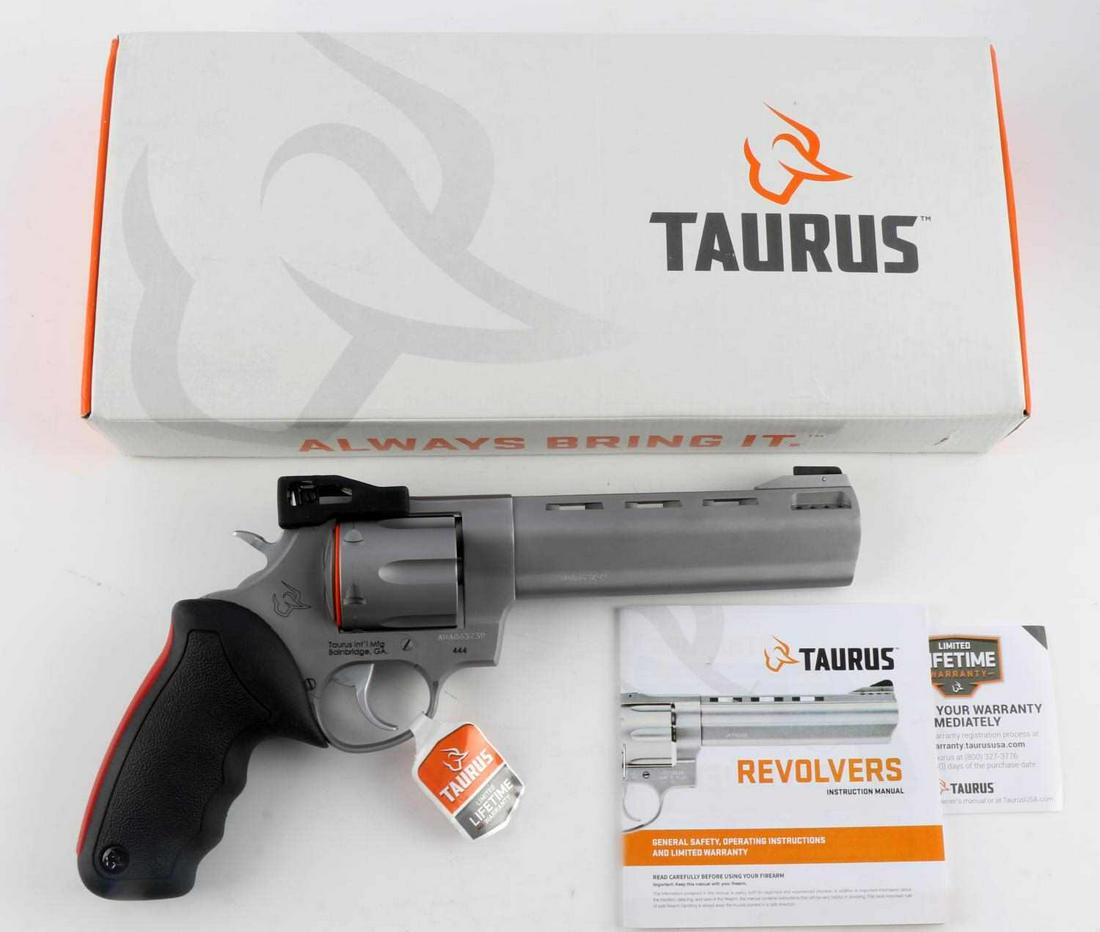 TAURUS RAGING BULL .44 MAG 6 SHOT REVOLVER SATIN: New in box satin finish .44 Mag revolver with a 6 5/8 inch barrel, mint bore, clear markings, and rubber grip. Fixed front and notched rear sights. Comes in original box with manual. Requires FFL for 