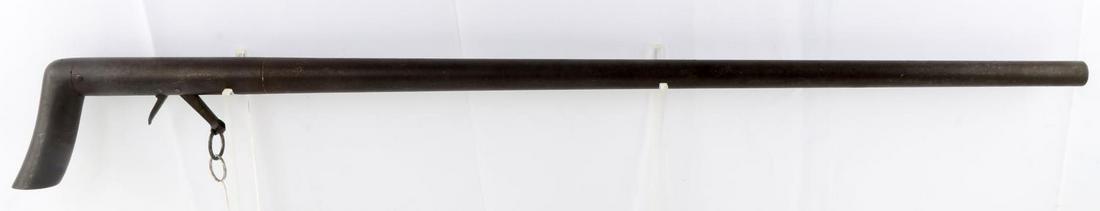 ANTIQUE IRON WALKING STICK CANE GUN UNMARKED: Solid iron percussion cane gun with under barrel trigger, 27 inch barrel with 17 mm bore, clear bore with some pitting. Unknown maker. Entire length is 36.5 inches. Good condition. No international sh