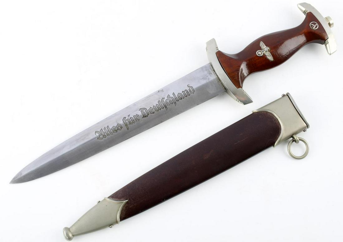 WWII GERMAN REICH SA HONOR TUTTLINGEN DAGGER: WWII German Reich SA honor dagger from "Aesculap Tuttlingen" which is found with a maker's mark on the ricasso of the back side of the blade. In total, the blade is in good condition with what appears