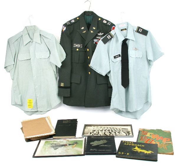 ARCHIVE & AVIATOR TUNIC COMPLETE INSIGNIA NAMED: Aviator tunic grouping belonging Colonel Wallace David "Pop" Simpson. Grouping includes dress tunic, complete with all wings, including Senior Pilot Wings, Navigator / Observer Wings, All ribbons, nam
