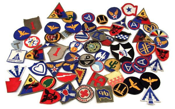 60 PLUS WW2 SHOULDER PATCH COLLECTION: A grouping from the estate of a WW2 Red Cross nurse volunteer stationed in the Pacific and elsewhere, over 60 original patches , Division, Corp, AAF , Tank Corp and more, even a Red Cross Club Mobile 
