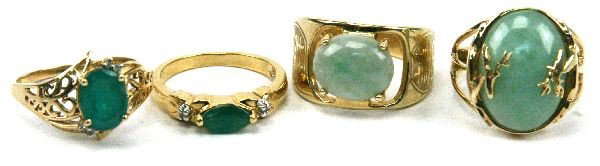 LADIES GOLD & VERMILION JADE & BERYL RING LOT (4): Ladies size 8 14K ring with an approx. 7.6ct oval green jade cabochon with deer head design. Ladies size 9 10K gold ring with an approx. 3.2ct oval green jade cabochon in a four-prong setting. Ladies 