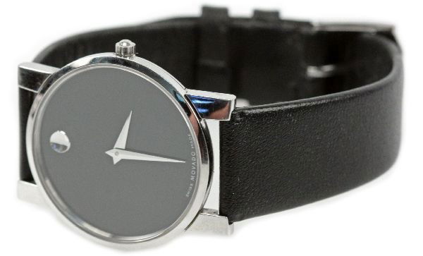 MENS MOVADO MUSEUM STAINLESS WRISTWATCH: Model # 84G4875. Serial #9504197. Includes box, instruction manual, and warranty. Movement: automatic quartz Case: 30mm stainless steel Band: Adjustable Movado black leather band Face, Dial, Hands: Bl