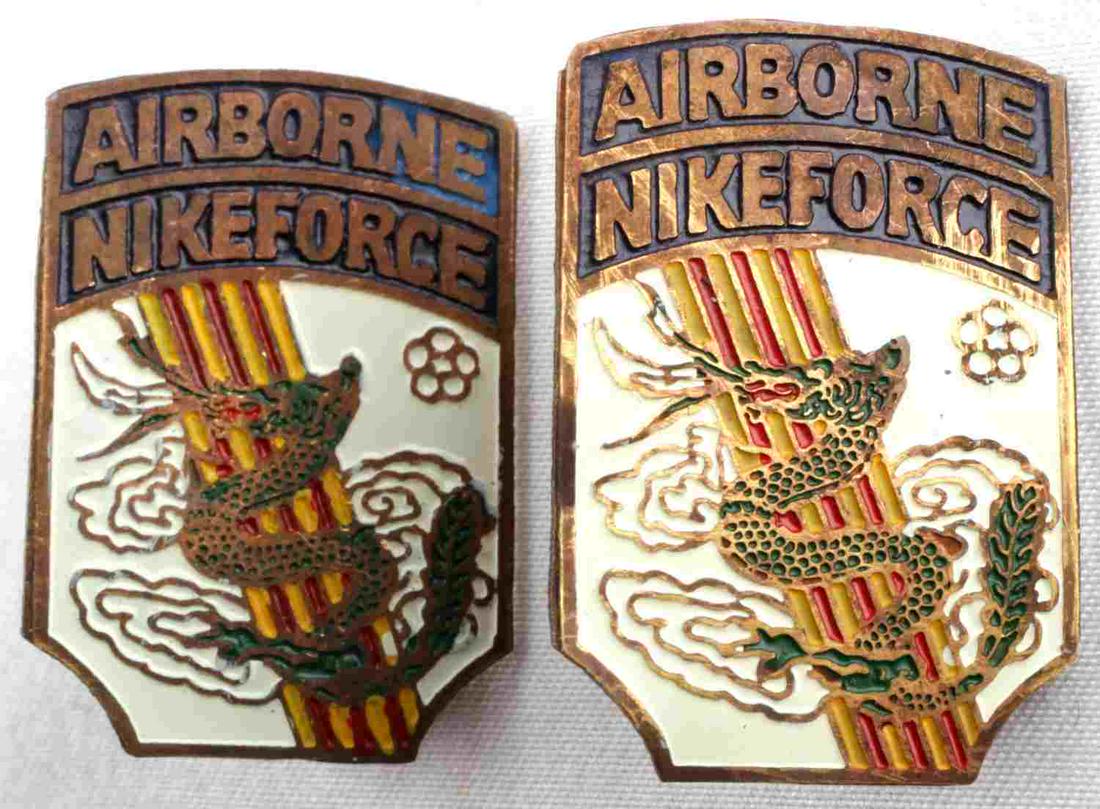 US VIETNAM ERA AIRBORNE COLLAR INSIGNIA THEATER: Pair of US Viet Nam Era Army AIRBORNE NIKEFORCE Beer Can Distinctive Collar Insignia, measures approx. 1 X 1.25 inches. The front shows a dragon in the center with the South Vietnamese colors in the b