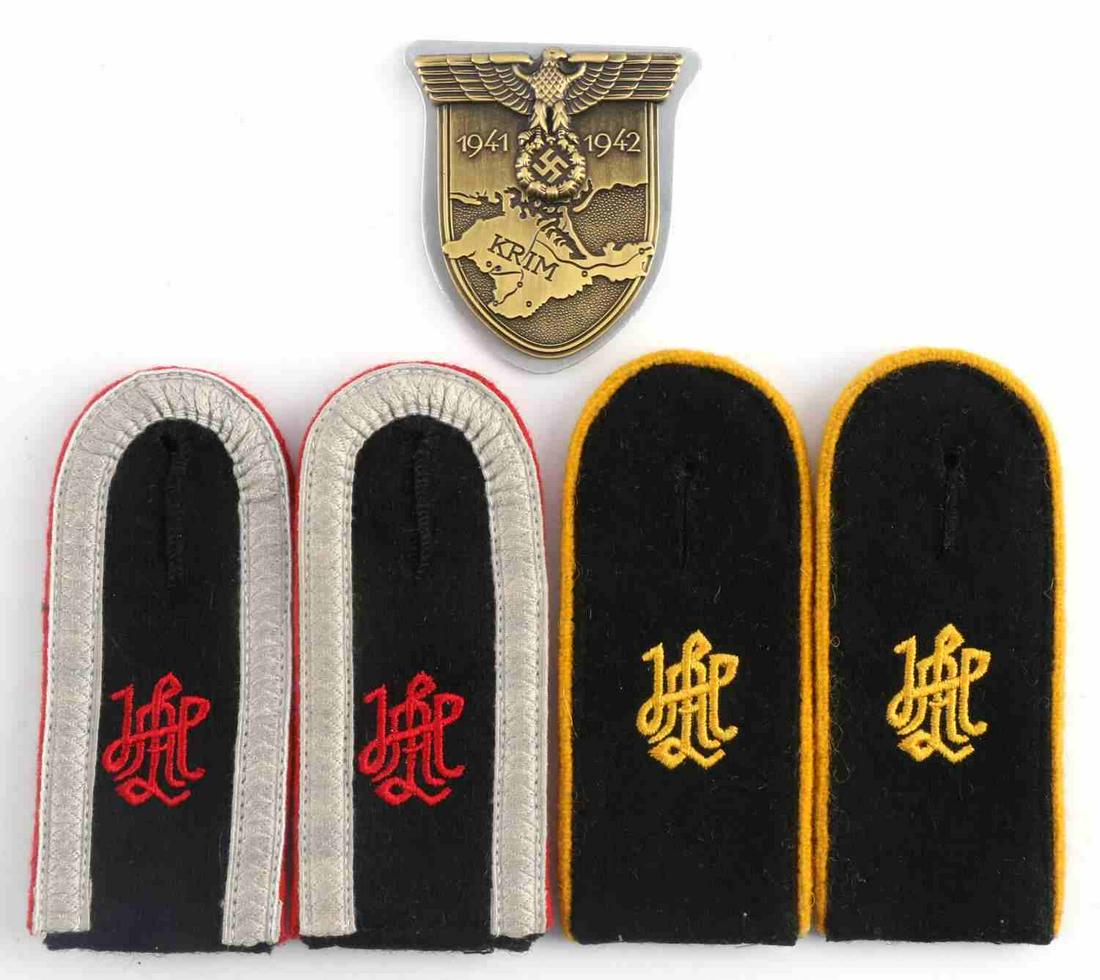 WWII GERMAN SS SLEEVE SHEILD & SHOULDER BOARDS: German WWII Army KRIM 1941 1942 Sleeve Shield. Measures 1.75 inches wide by 2.75 inches tall. The front shows a map of the Krim area. There is a German eagle clutching a swastika in his talons at the 