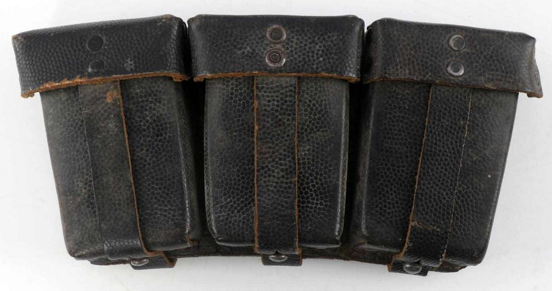 WWII GERMAN THIRD REICH MAUSER LEATHER AMMO POUCH: WWII German Third Reich Waffen SS Mauser K-98 Rifle Leather Ammo Pouch, measures approx. 8.5 X 4 X 1.5 inches. Has three attached pouches that hold the Mauser K-98 bullet rounds. The reverse side is m