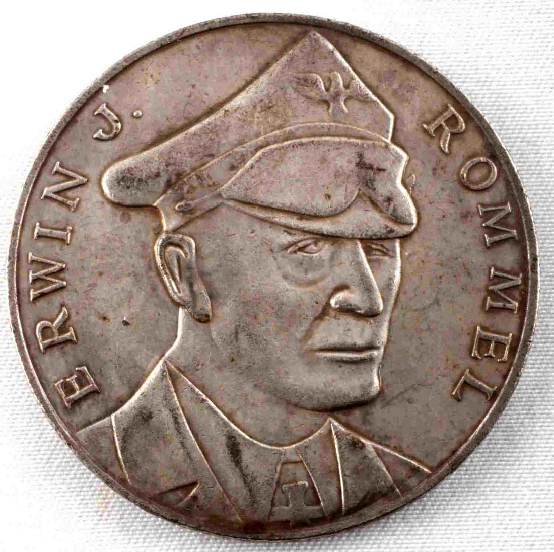 WWII GERMAN THIRD REICH GENERAL ERWIN ROMMEL COIN: WWII German Third Reich General Field Marshal Erwin Rommel Coin, measures approx. 1.5 inches in diameter. The front shows a bust image of Rommel wearing his uniform and visor. It reads "Erwin J. Romme