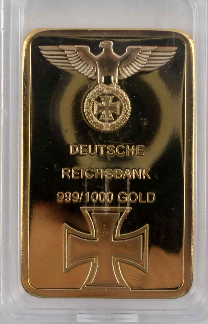 WWII GERMAN 3RD REICH FACSIMILE REICHBANK GOLD BAR: WWII German Third Reich Facsimile German World War II Deutsche Reichbank Gold Bar, measures approx. 1.25 X 1.75 inches. The front reads "Deutsche Reichsbank 999/1000 Gold." There is a German eagle wit