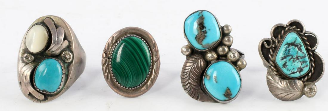FOUR STERLING SILVER SOUTHWEST RINGS WITH STONES: Lot of FOUR (4) Sterling silver southwest/native style rings. Rings feature turquoise nuggets varying in size, turquoise, moonstone and malachite. One ring is marked with "H.J." Sizes: 11.5, 8.25, 7.5