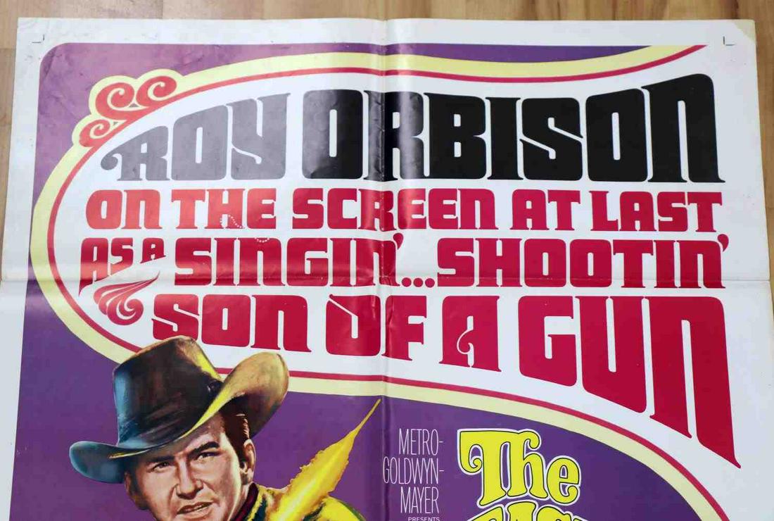 FASTEST GUITAR ALIVE ROY ORBISON ORIG ONE SHEET: Vintage "THE FASTEST GUITAR ALIVE" original 1967 theatrical one-sheet movie poster. Measures approx. 27 X 41 inches. Some tape at edges, foxing to reverse, some pinholes present. Minor separation at c