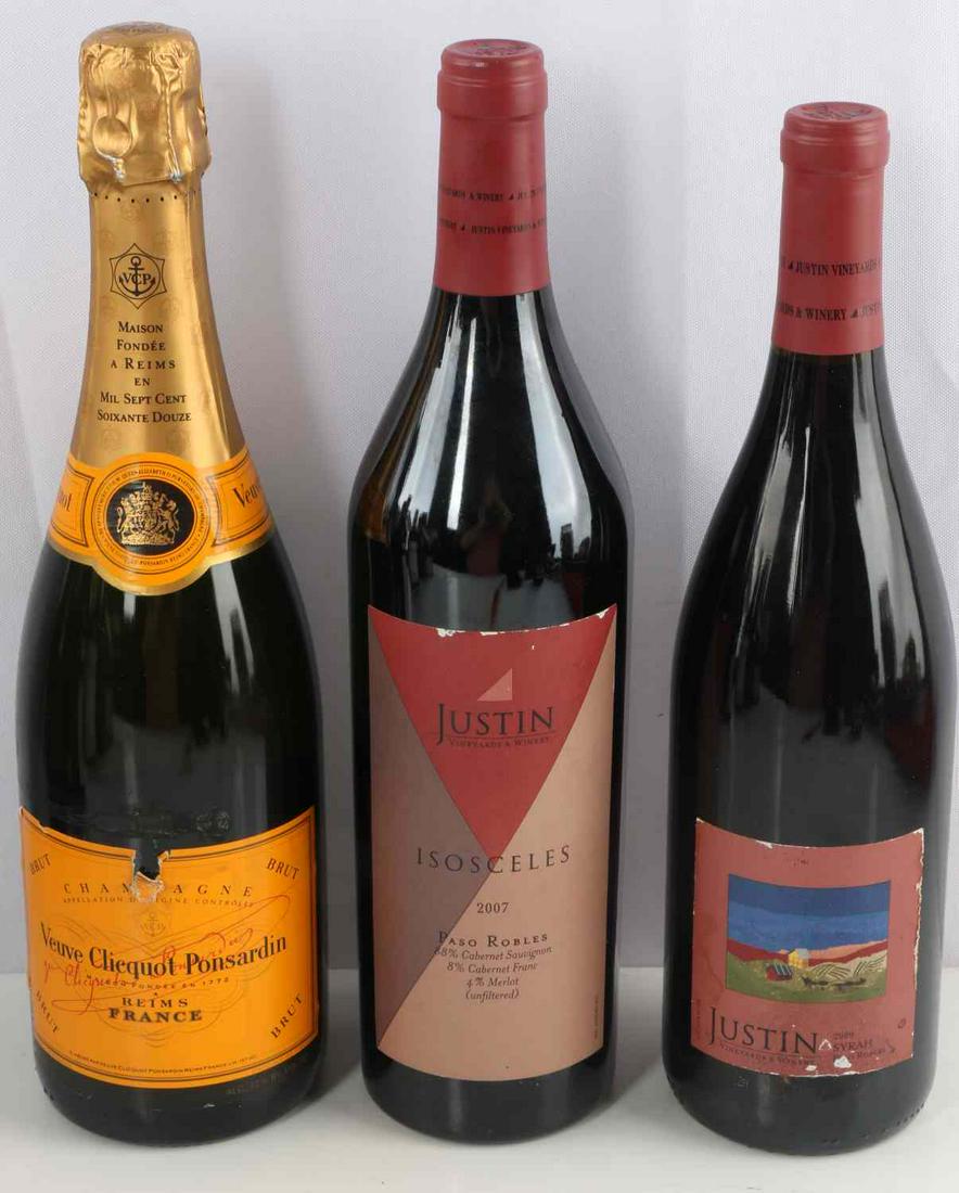 TWO CALIFORNIA RED WINES & ONE FRENCH CHAMPAGNE: Lot of 3. One (1) bottle of Veuve Cliquot Ponsardin French Champagne Brut (yellow label), one (1) bottle of 2009 Justin Vineyards & Winery Syrah, and one (1) bottle of 2007 Justin Vineyards & Winery I