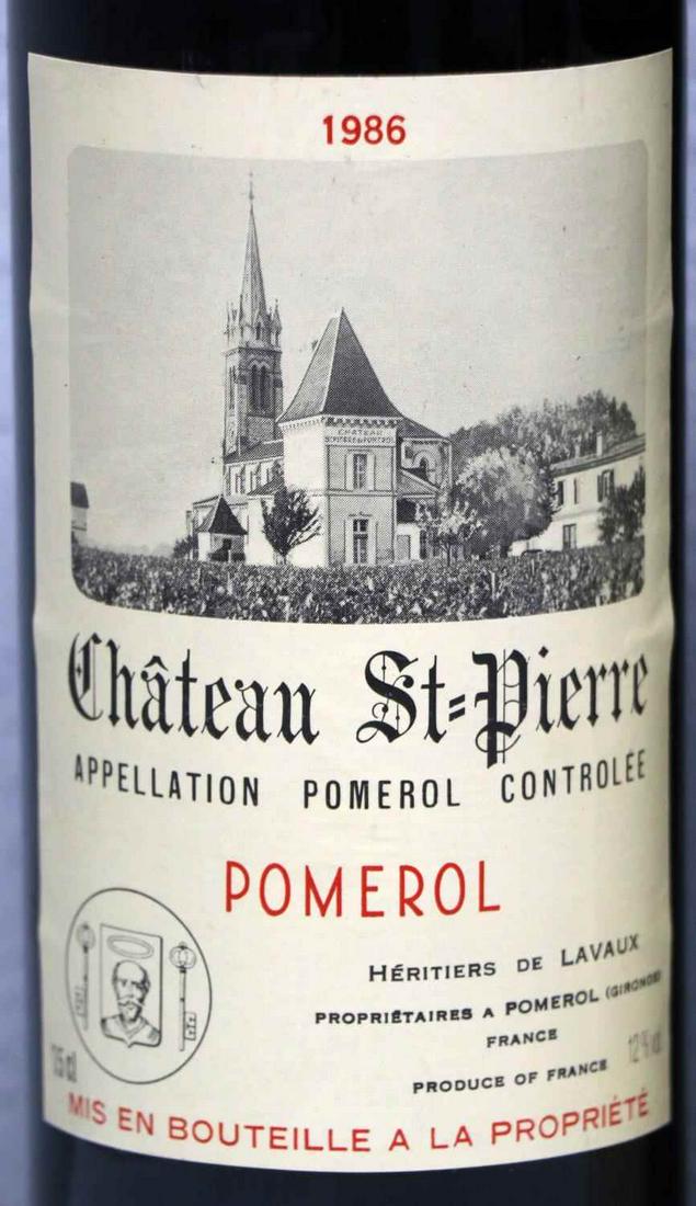 1986 CHATEAU ST PIERRE POMEROL & 2000 BERINGER: Lot features a 1986 Chateau St. Pierre Pomerol with upper mid shoulder ullage, very good label, and good seal. Also a 2000 Beringer Bancroft Ranch Howell Mountain Napa Valley Merlot with ullage into n