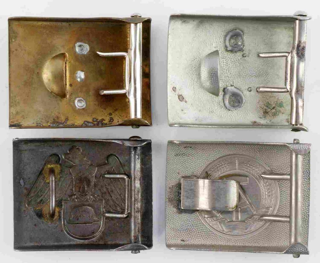 LOT OF RUSSIAN AND GERMAN MILITARY BELT BUCKLES: Lot features Russian and German belt buckles. Aluminum, steel, and brass construction. Measure 2 1/2 inches. Very good condition. No marks. Unauthenticated, sold as is.