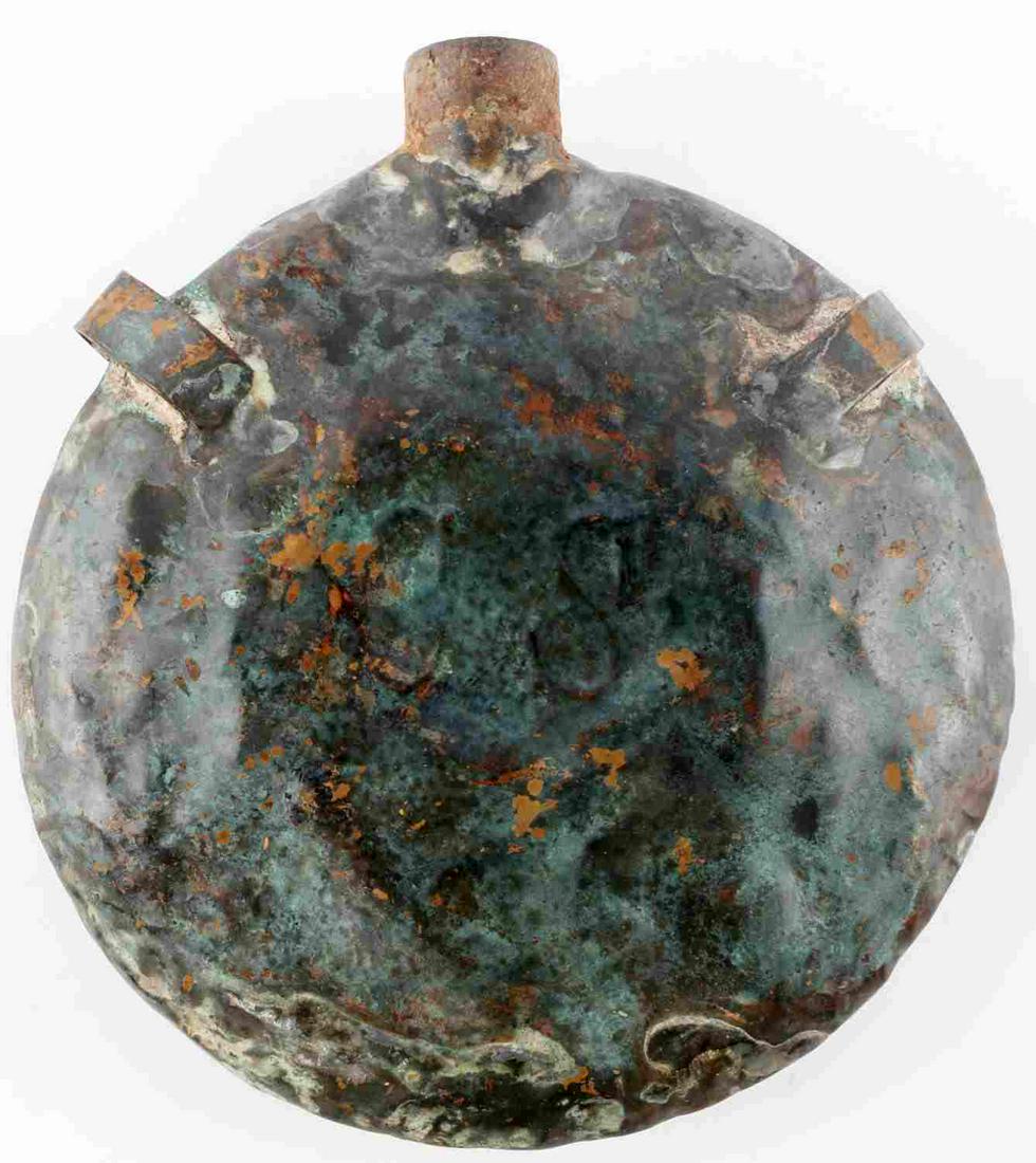CIVIL WAR CONFEDERATE STATES COPPER CANTEEN: Confederate States copper canteen. CS marked. Features oxidation and denting. Missing mouthpiece covering. Measures 5 1/2 inches diameter. Unauthenticated, sold as is.